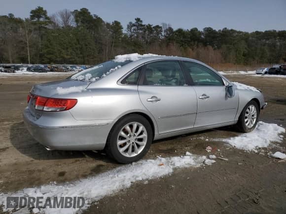 2007 Hyundai Azera SE z VIN KMHFC46F47A188591, wystawiony jako Copart lot #87225494 z przebiegiem 86 047 mil mil oraz Szkoda całkowita • Salvage title. Historia ofert i sprzedaży dostępna na DreamBid. Obrazek 3.