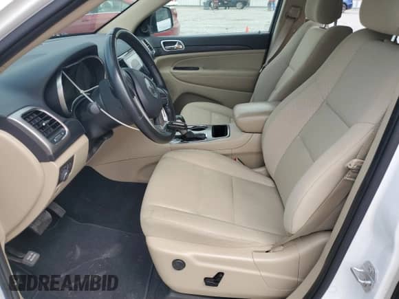 2020 Jeep Grand Cherokee Laredo E with VIN 1C4RJEAG7LC140868, listed as a Copart auction lot 69587565 with 76,879 mi miles and Salvage title. Bid and sale history available at DreamBid. Image 7.