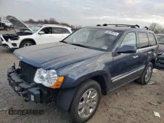 2010 Jeep Grand Cherokee Limited z VIN 1J4RR5GTXAC111661, wystawiony jako Copart lot #52074245 z przebiegiem 156 157 mil mil oraz Szkoda całkowita • Salvage title. Historia ofert i sprzedaży dostępna na DreamBid. Obrazek 1.