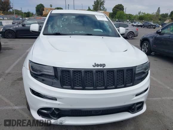 2014 Jeep Grand Cherokee SRT-8 z VIN 1C4RJFDJ7EC536055, wystawiony jako IAAI lot #42194498 z przebiegiem 80 241 mil mil oraz . Historia ofert i sprzedaży dostępna na DreamBid. Obrazek 12.