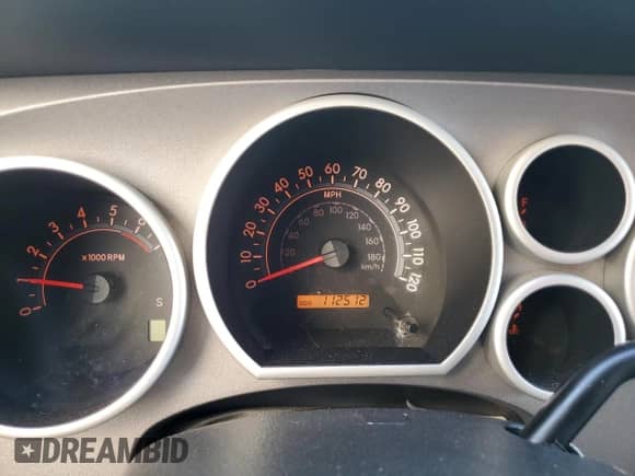 2012 Toyota Tundra z VIN 5TFRU5F13CX026371, wystawiony jako Copart lot #77576564 z przebiegiem 112 512 mil mil oraz Szkoda całkowita • Salvage title. Historia ofert i sprzedaży dostępna na DreamBid. Obrazek 9.