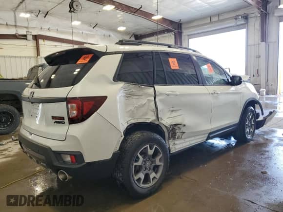 2022 Honda Passport TrailSport с VIN 5FNYF8H6XNB011301, выставлен на аукционе Copart как лот 67362075 с пробегом 36 327 миль миль и На запчасти • Non repairable. История ставок и продаж доступна на DreamBid. Изображение 3.