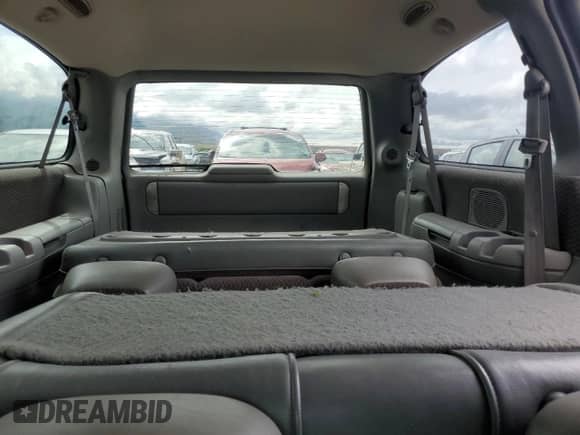 1999 Dodge Caravan SE with VIN 1B4GT44L0XB893221, listed as a Copart auction lot 56673125 with 242,497 mi miles and Salvage title. Bid and sale history available at DreamBid. Image 10.