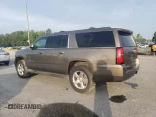 2016 Chevrolet Suburban LT with VIN 1GNSKHKC5GR255281, listed as a Copart auction lot 68735345 with 165,670 mi miles and Clean title. Bid and sale history available at DreamBid. Image 2.