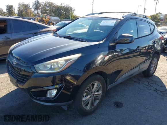 2014 Hyundai Tucson SE with VIN KM8JU3AG3EU925714, listed as a IAAI auction lot 43365574 with 39,987 mi miles and . Bid and sale history available at DreamBid. Image 2.