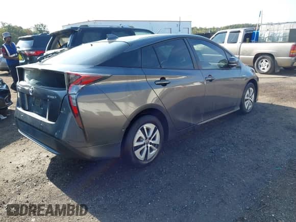 2018 Toyota Prius Two Eco with VIN JTDKARFU1J3067548, listed as a IAAI auction lot 43238379 with 146,282 mi miles and . Bid and sale history available at DreamBid. Image 4.