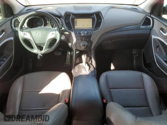 2015 Hyundai Santa Fe z VIN 5XYZU3LB5FG284321, wystawiony jako Copart lot #86295125 z przebiegiem 106 640 mil mil oraz Szkoda całkowita • Salvage title. Historia ofert i sprzedaży dostępna na DreamBid. Obrazek 8.