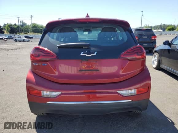 2020 Chevrolet Bolt EV Premier с VIN 1G1FZ6S03L4143028, выставлен на аукционе Copart как лот 64743825 с пробегом 42 983 миль миль и Списание • Salvage title. История ставок и продаж доступна на DreamBid. Изображение 6.
