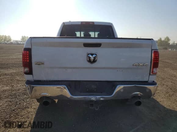 2014 Ram 1500 Laramie z VIN 1C6RR7JM3ES398766, wystawiony jako Copart lot #81518925 z przebiegiem 95 954 mil mil oraz Szkoda całkowita • Salvage title. Historia ofert i sprzedaży dostępna na DreamBid. Obrazek 6.