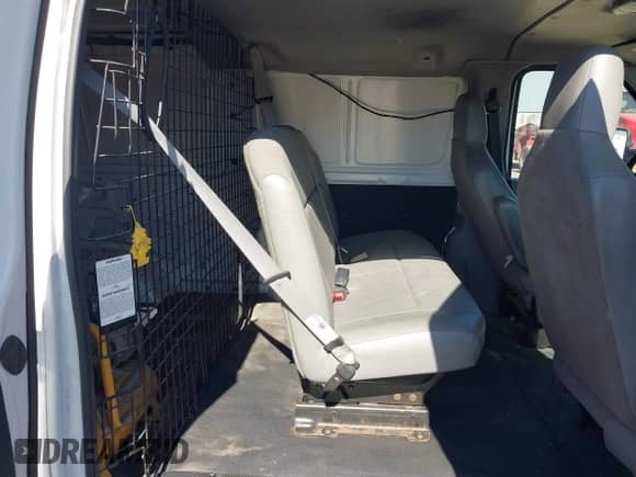 2014 Ford Econoline Cargo Commercial with VIN 1FTNE1EL7EDA59384, listed as a IAAI auction lot 43391909 with 306,342 mi miles and . Bid and sale history available at DreamBid. Image 8.