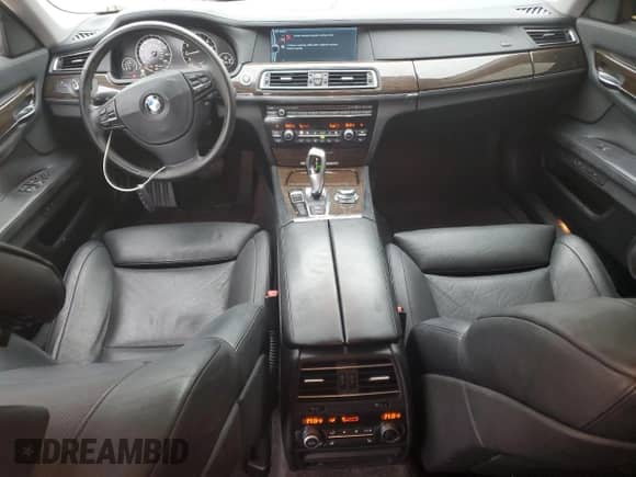 2010 BMW 7 Series 750i xDrive with VIN WBAKC6C57ACL67534, listed as a Copart auction lot 51488665 with 139,400 mi miles and Salvage title. Bid and sale history available at DreamBid. Image 8.