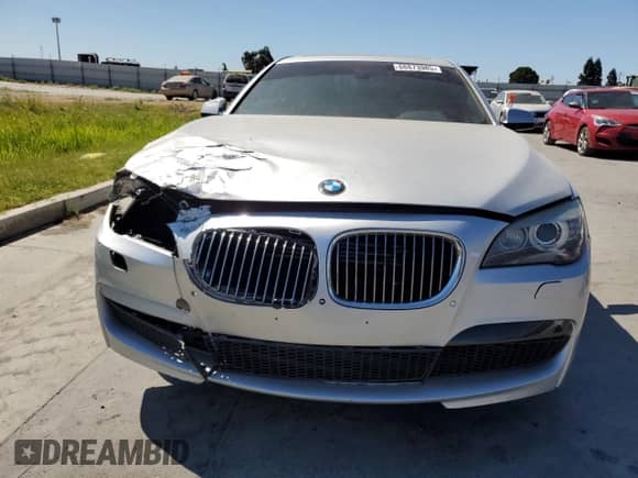 2012 BMW 7 Series 750Li с VIN WBAKB8C5XCC965182, выставлен на аукционе Copart как лот 68873985 с пробегом Не указан миль и Списание • Salvage title. История ставок и продаж доступна на DreamBid. Изображение 5.
