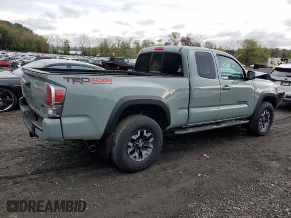 2022 Toyota Tacoma SR z VIN 3TYSZ5AN6NT076787, wystawiony jako Copart lot #86312735 z przebiegiem 22 446 mil mil oraz Szkoda całkowita • Salvage title. Historia ofert i sprzedaży dostępna na DreamBid. Obrazek 3.