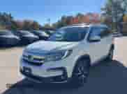 2022 Honda Pilot Elite z VIN 5FNYF6H08NB061842, wystawiony jako IAAI lot #43489129 z przebiegiem 141 490 mil mil oraz . Historia ofert i sprzedaży dostępna na DreamBid. Obrazek 2.
