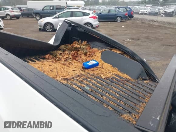 2018 Toyota Tacoma SR5 z VIN 5TFSZ5AN9JX161137, wystawiony jako IAAI lot #42857176 z przebiegiem Nie podano mil oraz . Historia ofert i sprzedaży dostępna na DreamBid. Obrazek 8.