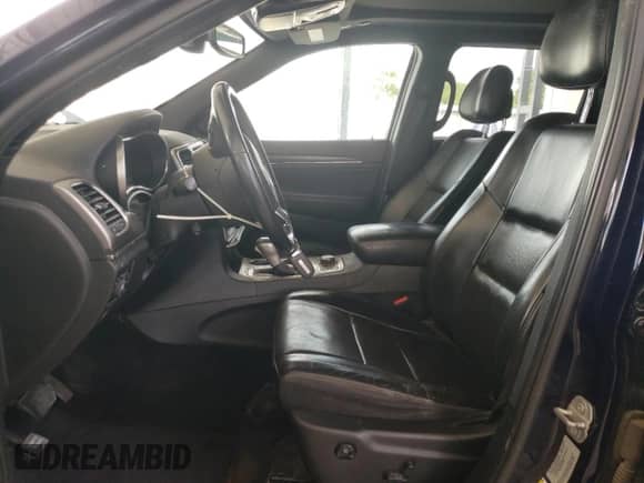 2018 Jeep Grand Cherokee Sterling z VIN 1C4RJFBG8JC127306, wystawiony jako Copart lot #69199235 z przebiegiem 112 091 mil mil oraz Szkoda całkowita • Salvage title. Historia ofert i sprzedaży dostępna na DreamBid. Obrazek 7.