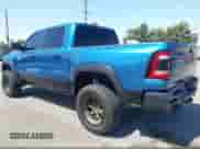 2024 Ram 1500 TRX with VIN 1C6SRFU95RN230215, listed as a IAAI auction lot 43197408 with 8,034 mi miles and . Bid and sale history available at DreamBid. Image 3.