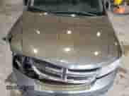 2013 Dodge Journey SXT z VIN 3C4PDCBG0DT522540, wystawiony jako Copart lot #82225205 z przebiegiem 200 251 mil mil oraz Nie do naprawy • Non repairable. Historia ofert i sprzedaży dostępna na DreamBid. Obrazek 12.