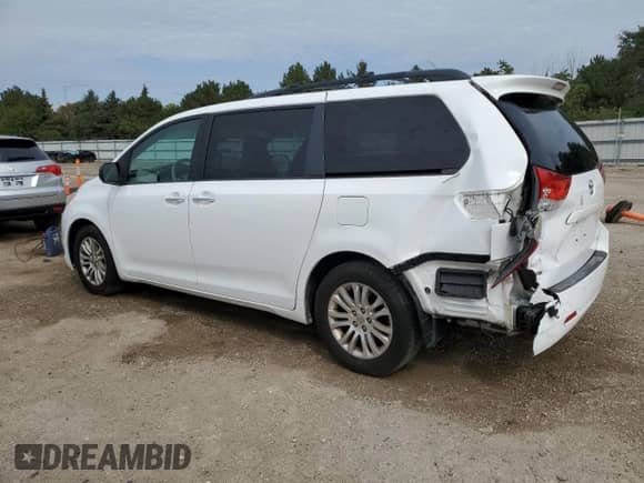 2014 Toyota Sienna XLE with VIN 5TDYK3DC8ES498567, listed as a Copart auction lot 81624795 with 187,288 mi miles and Salvage title. Bid and sale history available at DreamBid. Image 2.