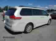 2012 Toyota Sienna XLE AAS with VIN 5TDYK3DC8CS190893, listed as a Copart auction lot 89573505 with 145,575 mi miles and Salvage title. Bid and sale history available at DreamBid. Image 3.