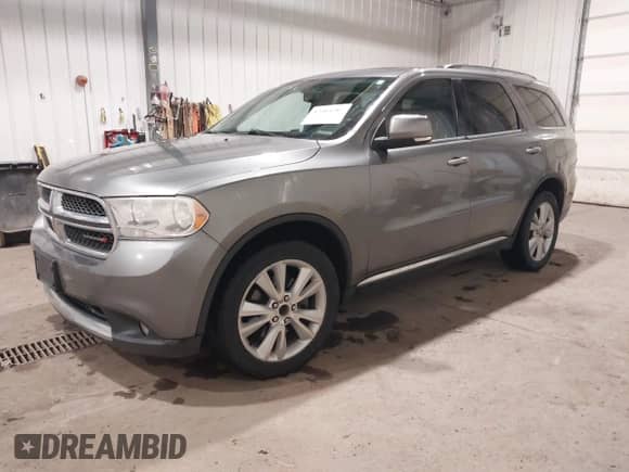 2012 Dodge Durango Crew with VIN 1C4SDJDT2CC309415, listed as a IAAI auction lot 42304287 with 150,964 mi miles and . Bid and sale history available at DreamBid. Image 2.