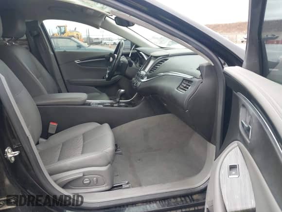 2018 Chevrolet Impala LT with VIN 1G1105SA7JU138922, listed as a IAAI auction lot 43323071 with 149,546 mi miles and . Bid and sale history available at DreamBid. Image 5.