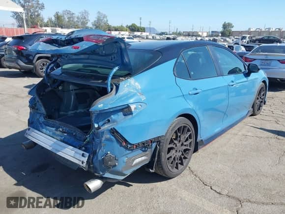 2022 Toyota Camry TRD с VIN 4T1KZ1AK7NU065296, выставлен на аукционе IAAI как лот 43007929 с пробегом 109 033 миль миль и . История ставок и продаж доступна на DreamBid. Изображение 4.