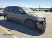 2014 Dodge Journey American Value with VIN 3C4PDCAB8ET301257, listed as a Copart auction lot 67421645 with 96,794 mi miles and Salvage title. Bid and sale history available at DreamBid. Image 4.