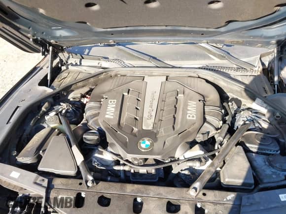 2012 BMW 7 Series 750i xDrive z VIN WBAKC6C56CDX99500, wystawiony jako IAAI lot #41362148 z przebiegiem 116 391 mil mil oraz . Historia ofert i sprzedaży dostępna na DreamBid. Obrazek 9.