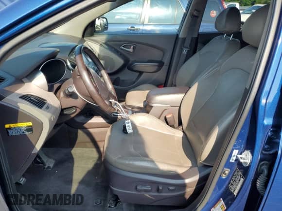 2014 Hyundai Tucson Limited with VIN KM8JUCAG9EU796720, listed as a Copart auction lot 60671805 with 130,114 mi miles and Salvage title. Bid and sale history available at DreamBid. Image 7.