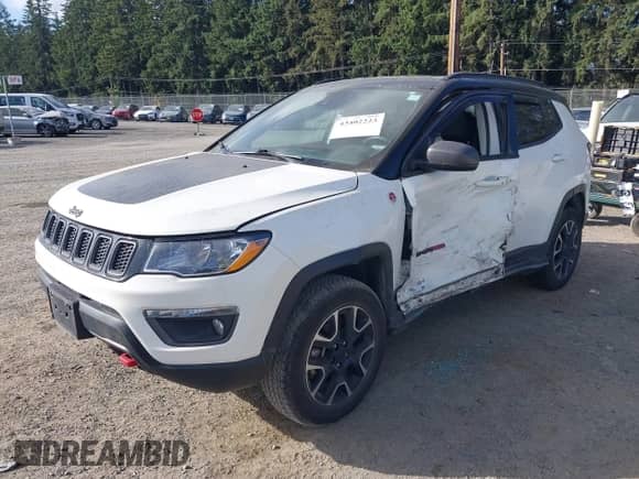 2021 Jeep Compass Trailhawk z VIN 3C4NJDDB2MT589180, wystawiony jako IAAI lot #43402223 z przebiegiem 76 756 mil mil oraz . Historia ofert i sprzedaży dostępna na DreamBid. Obrazek 2.