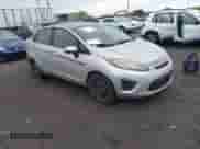 2013 Ford Fiesta S with VIN 3FADP4AJ7DM191498, listed as a IAAI auction lot 43445206 with 165,406 mi miles and . Bid and sale history available at DreamBid. Image 1.