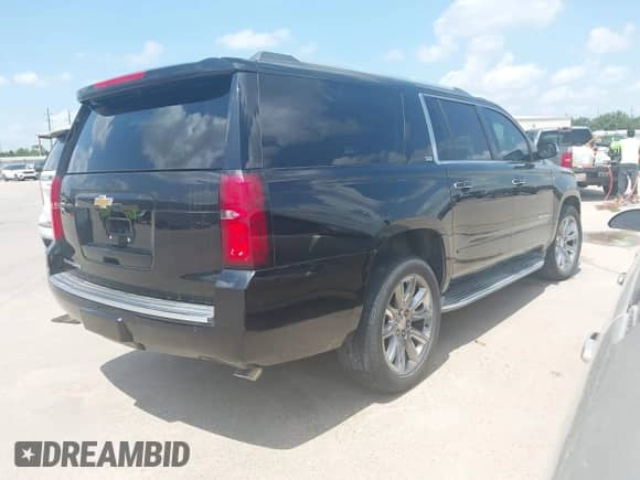 2015 Chevrolet Suburban LTZ with VIN 1GNSCKKC4FR254373, listed as a IAAI auction lot 42838527 with Not provided miles and . Bid and sale history available at DreamBid. Image 4.