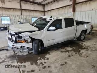 2018 Chevrolet Silverado 1500 LT z VIN 3GCUKREC5JG311164, wystawiony jako Copart lot #82106855 z przebiegiem 113 751 mil mil oraz Szkoda całkowita • Salvage title. Historia ofert i sprzedaży dostępna na DreamBid. Obrazek 1.