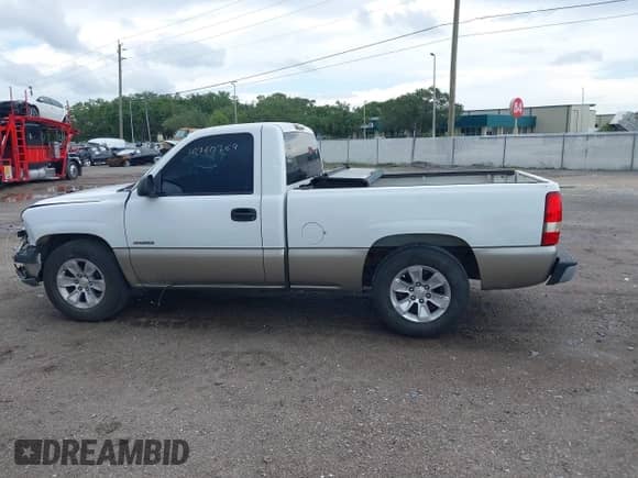 2001 Chevrolet Silverado 1500 with VIN 1GCEC14W01Z239000, listed as a IAAI auction lot 42760269 with 184,299 mi miles and . Bid and sale history available at DreamBid. Image 14.