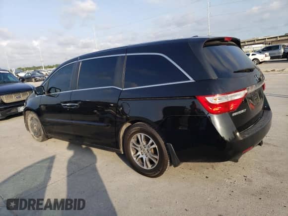 2013 Honda Odyssey EX-L z VIN 5FNRL5H66DB023651, wystawiony jako Copart lot #48676274 z przebiegiem 164 687 mil mil oraz Szkoda całkowita • Salvage title. Historia ofert i sprzedaży dostępna na DreamBid. Obrazek 2.