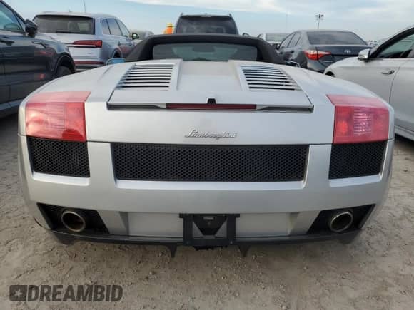2007 Lamborghini Gallardo с VIN ZHWGU22T57LA05137, выставлен на аукционе Copart как лот 76275354 с пробегом Не указан миль и Списание • Salvage title. История ставок и продаж доступна на DreamBid. Изображение 6.