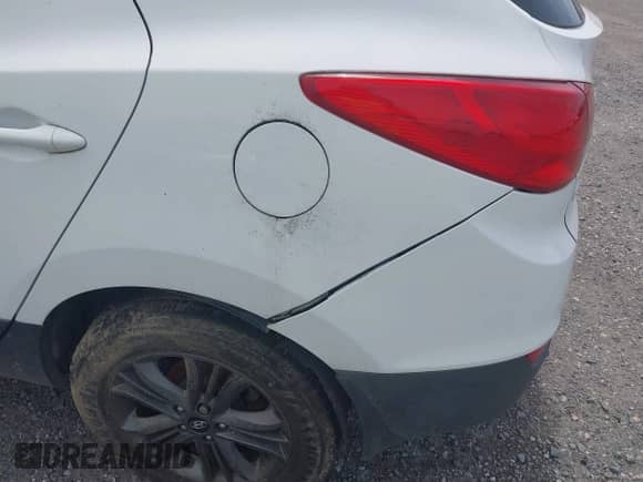 2015 Hyundai Tucson Limited z VIN KM8JU3AG6FU103457, wystawiony jako IAAI lot #42542566 z przebiegiem 150 066 mil mil oraz . Historia ofert i sprzedaży dostępna na DreamBid. Obrazek 18.