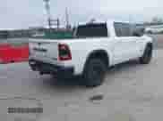 2022 Ram 1500 Rebel z VIN 1C6SRFLT1NN267513, wystawiony jako IAAI lot #41961821 z przebiegiem 140 488 mil mil oraz . Historia ofert i sprzedaży dostępna na DreamBid. Obrazek 4.