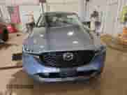 2023 Mazda CX-5 S Carbon Edition z VIN JM3KFBCM6P0194780, wystawiony jako Copart lot #70113105 z przebiegiem 50 849 mil mil oraz Szkoda całkowita • Salvage title. Historia ofert i sprzedaży dostępna na DreamBid. Obrazek 5.