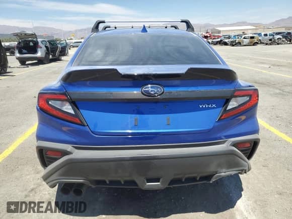 2023 Subaru WRX Premium with VIN JF1VBAF67P9817432, listed as a Copart auction lot 67545365 with 26,574 mi miles and Salvage title. Bid and sale history available at DreamBid. Image 6.