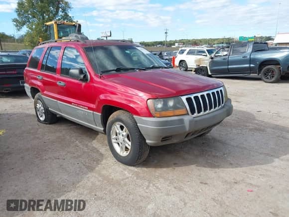 2002 Jeep Grand Cherokee Laredo with VIN 1J4GW48S22C174688, listed as a IAAI auction lot 43505430 with 215,268 mi miles and . Bid and sale history available at DreamBid. Image 1.