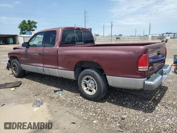 2000 Dodge Dakota с VIN 1B7GL22X2YS682259, выставлен на аукционе Copart как лот 55597935 с пробегом 80 706 миль миль и Списание • Salvage title. История ставок и продаж доступна на DreamBid. Изображение 2.