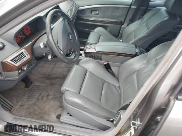 2006 BMW 7 Series 750Li с VIN WBAHN83506DT61317, выставлен на аукционе Copart как лот 66276815 с пробегом 32 000 миль миль и Списание • Salvage title. История ставок и продаж доступна на DreamBid. Изображение 7.