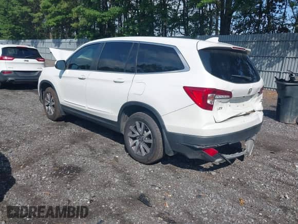 2021 Honda Pilot EX z VIN 5FNYF6H38MB072297, wystawiony jako IAAI lot #42561276 z przebiegiem 119 172 mil mil oraz . Historia ofert i sprzedaży dostępna na DreamBid. Obrazek 3.