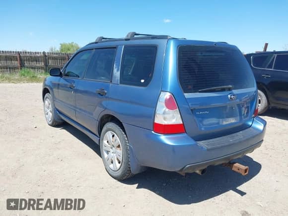 2007 Subaru Forester X with VIN JF1SG63627G718079, listed as a IAAI auction lot 42290134 with 303,089 mi miles and . Bid and sale history available at DreamBid. Image 3.