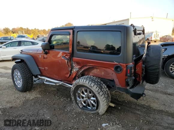2014 Jeep Wrangler Rubicon with VIN 1C4BJWCG6EL185596, listed as a Copart auction lot 78497654 with 69,875 mi miles and Salvage title. Bid and sale history available at DreamBid. Image 2.
