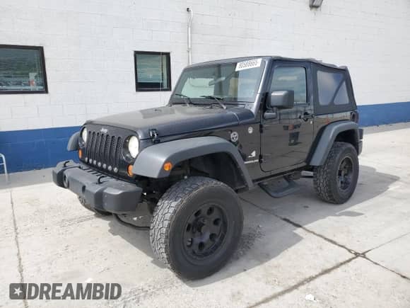 2007 Jeep Wrangler X с VIN 1J4FA24167L177693, выставлен на аукционе Copart как лот 80588665 с пробегом 169 483 миль миль и Списание • Salvage title. История ставок и продаж доступна на DreamBid. Изображение 1.