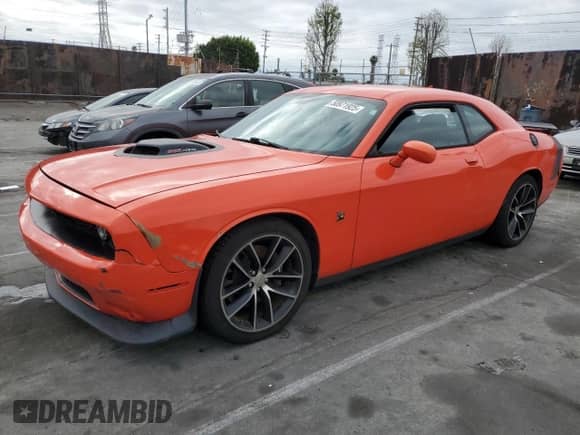 2016 Dodge Challenger 392 Hemi Scat Pack Shaker с VIN 2C3CDZFJXGH351790, выставлен на аукционе Copart как лот 60752105 с пробегом 69 129 миль миль и Списание • Salvage title. История ставок и продаж доступна на DreamBid. Изображение 1.