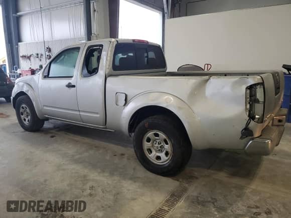 2010 Nissan Frontier SE with VIN 1N6BD0CT3AC422330, listed as a Copart auction lot 86508574 with 87,499 mi miles and Salvage title. Bid and sale history available at DreamBid. Image 2.